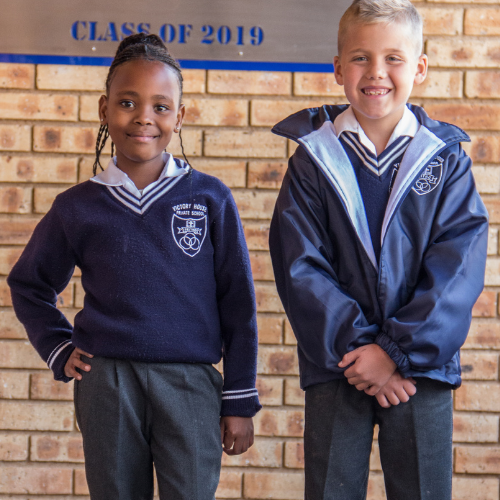 Navy Blue and White School Jersey with Emblem - Image 2